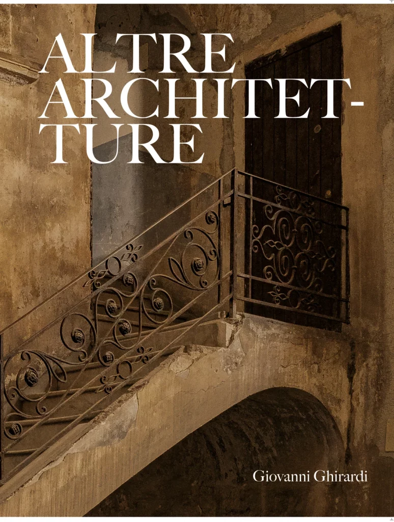 Cover of the book Altre Architetture by Giovanni Ghirardi: a stone staircase with a wrought-iron balustrade under a vault, warm ochre tones, the title in white capitals across the top